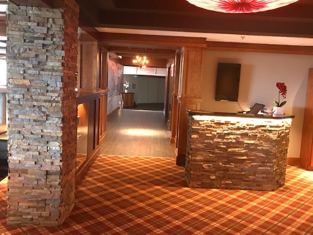 Norstone Ochre Rock Panels used on the host station and columns in the dining room at a country club in Wisconsin